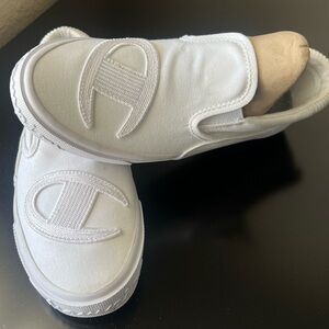 Champion unisex.  Man 7 woman 9.  White Slip-On Shoes